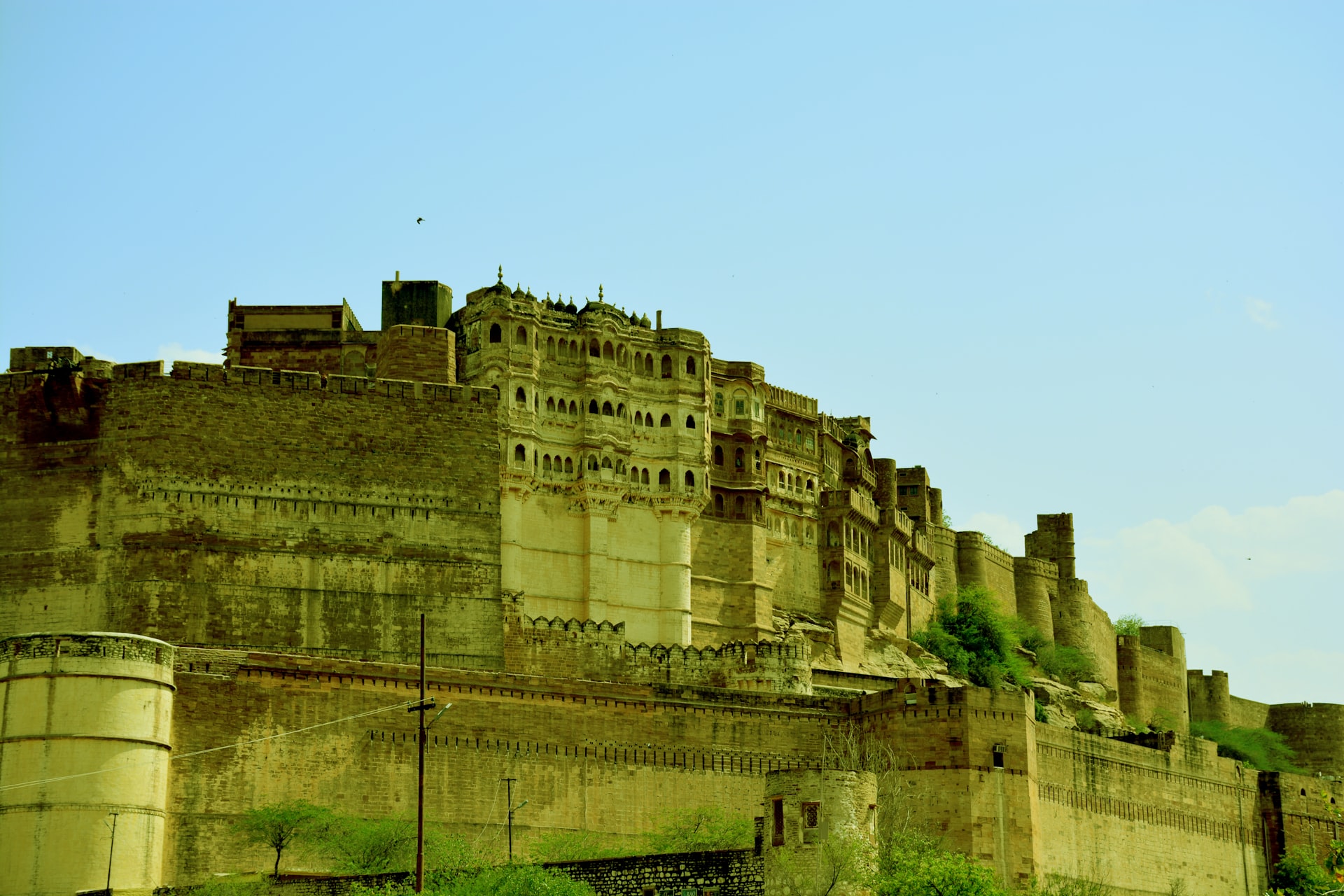 a castle like structure with a clock on the top of it