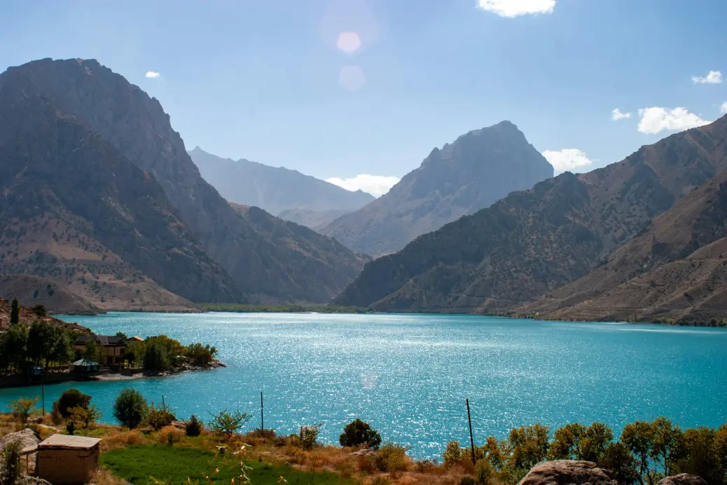 A large body of water surrounded by mountains