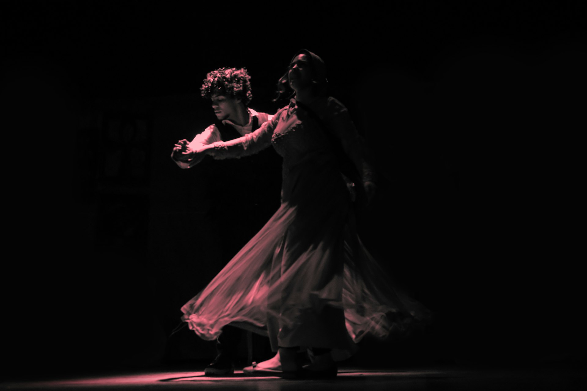 woman in black dress dancing