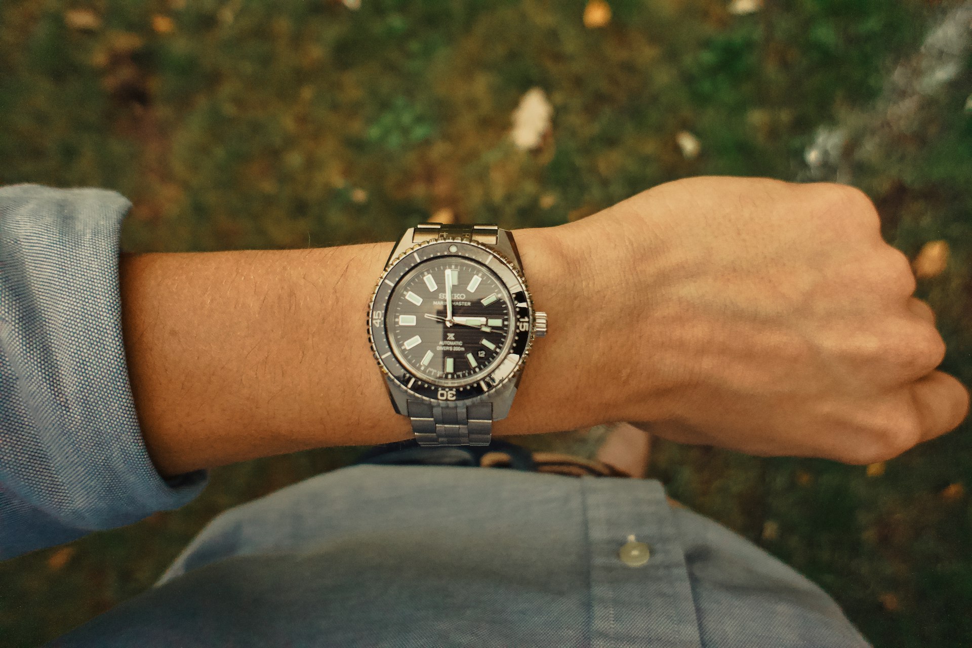 A close up of a person wearing a watch