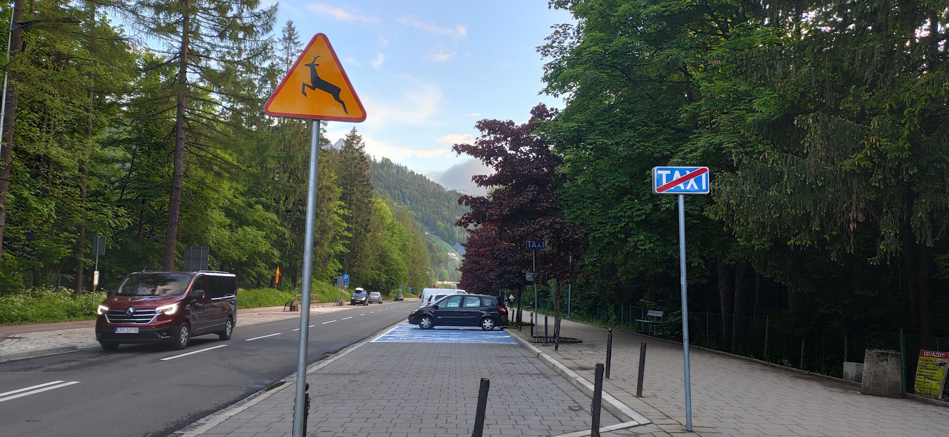 a car is parked on the side of the road